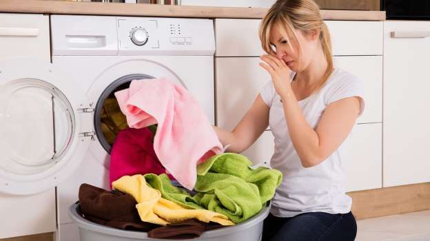 WHAT CAUSES THE BURNING SMELL FROM A WASHER?